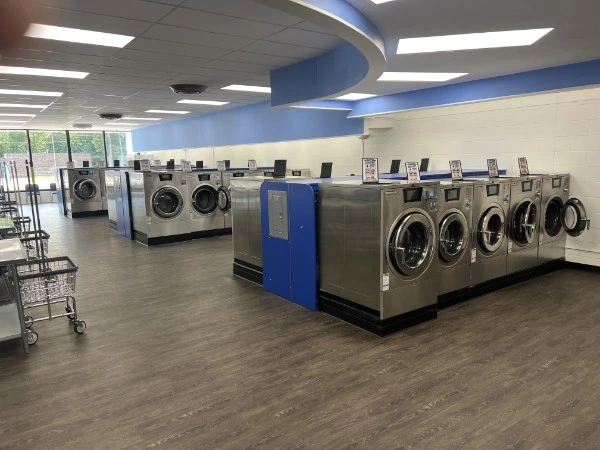 High-capacity washer banks at Laskey Laundry
